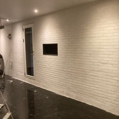 Renovering af facade på murstenshus på Sjælland