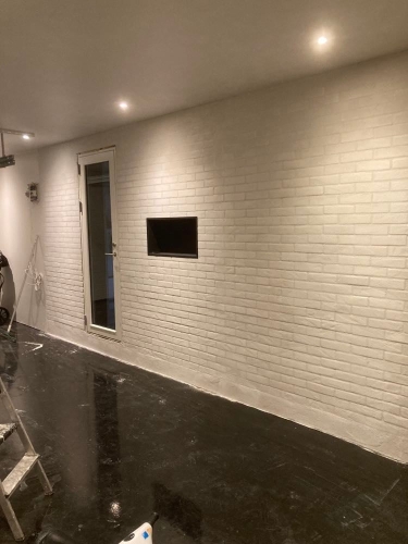 Renovering af facade på murstenshus på Sjælland